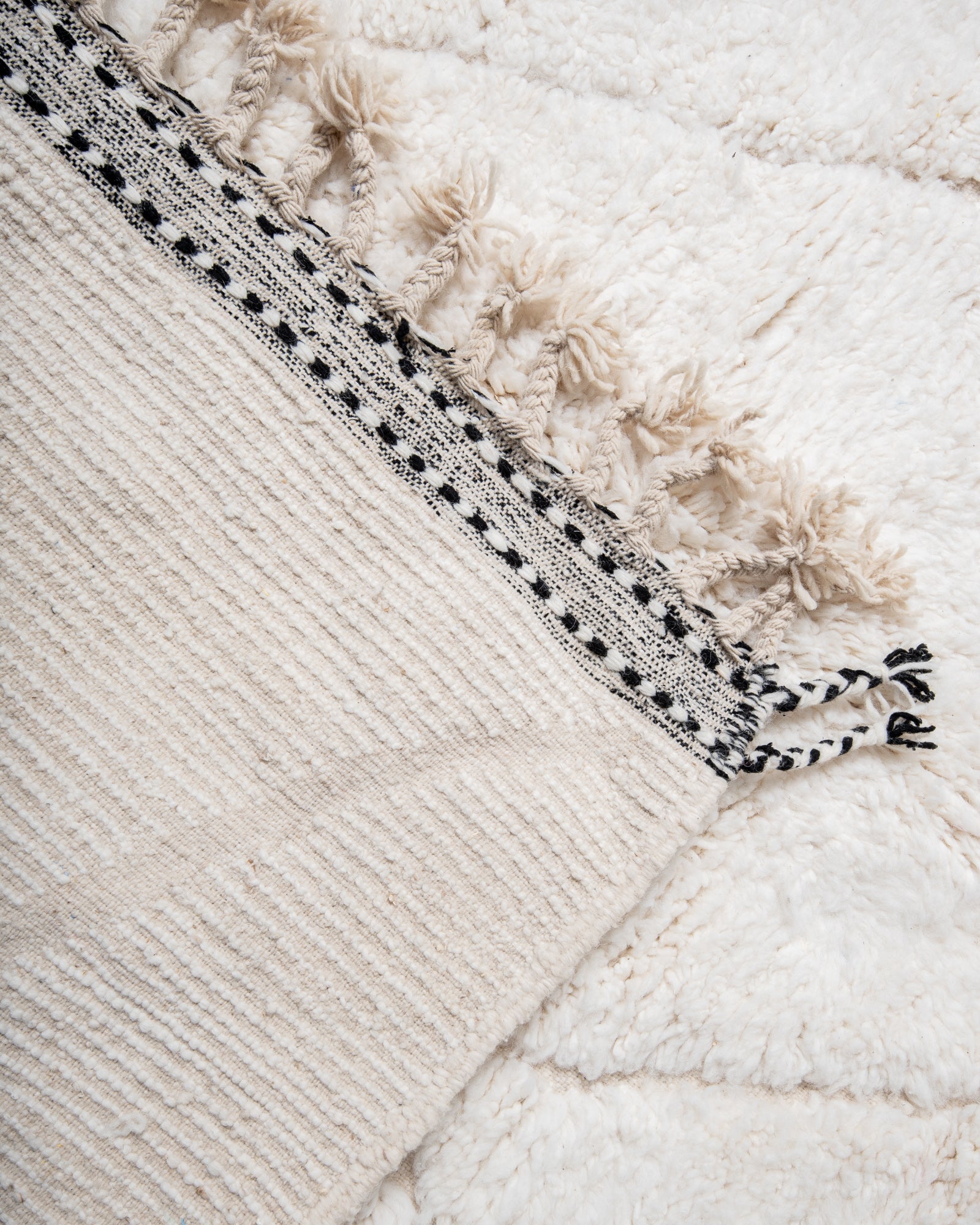 Modern, designer, handcrafted Berber rug from Morocco. Beniourain carpet with beautiful colours and patterns and fluffy wool texture.